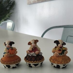 Enesco Cow Figurines with Orange, Brown, and Black Accents